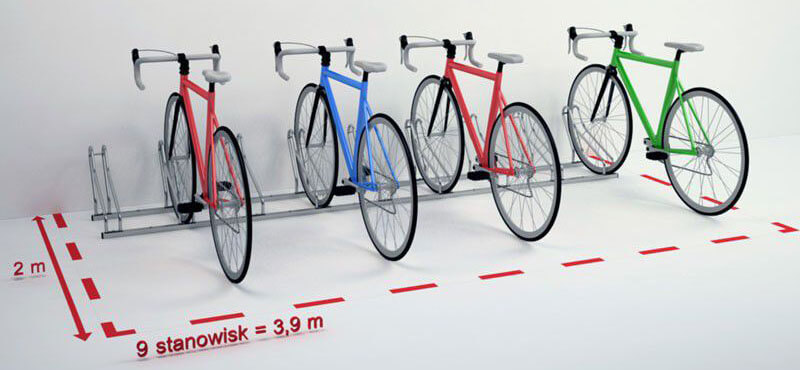 Dziewięć stanowisk stojaka Multibike 9 ustawionych pod kątem 45 stopni - wymagane miejsce 3,9 × 2 m